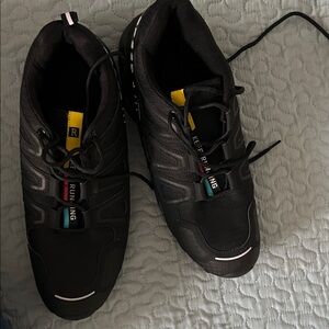 Keep Running Black running Shoes with Yellow and Blue Highlights